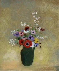 Grand vase vert avec fleurs mélangées